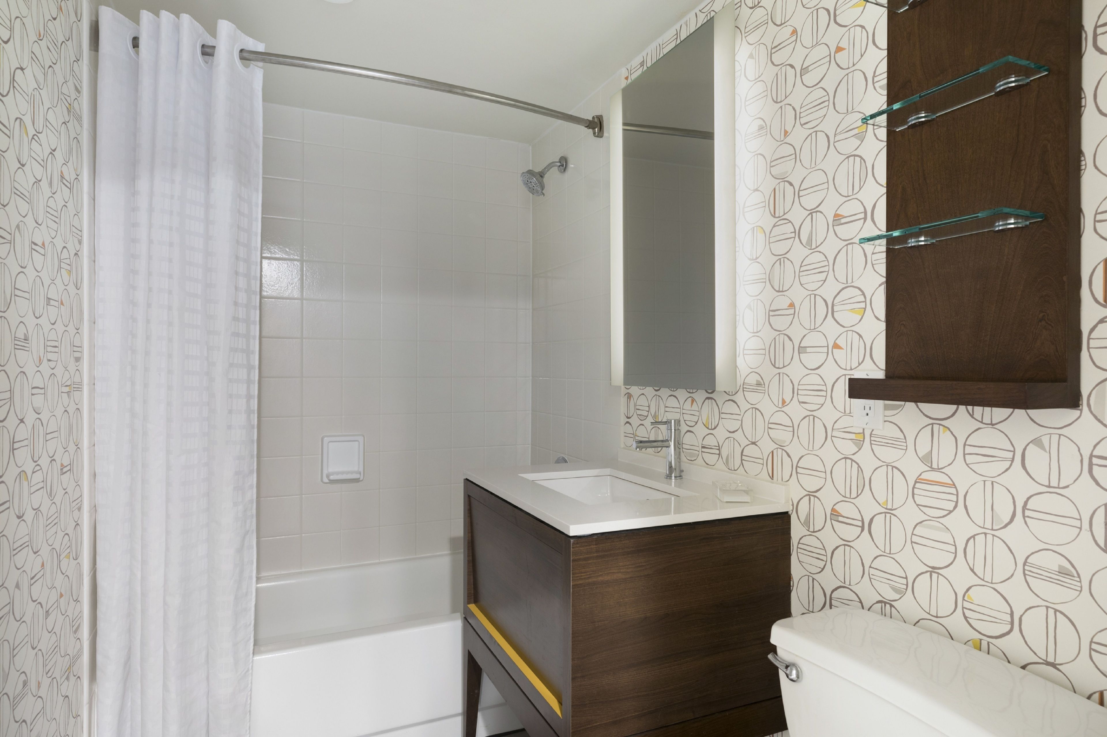combined shower/bathtub, eco-friendly toiletries, hair dryer, towels