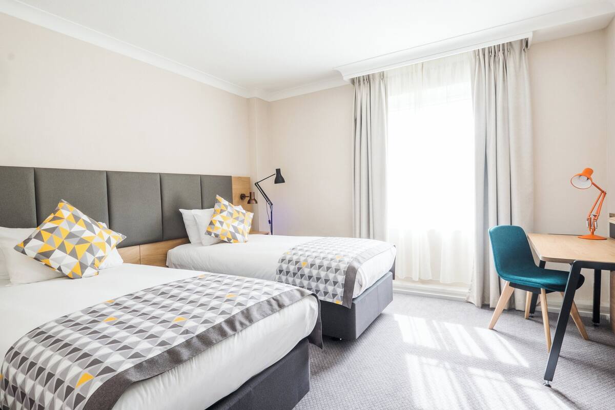 1 bedroom, desk, laptop workspace, blackout curtains