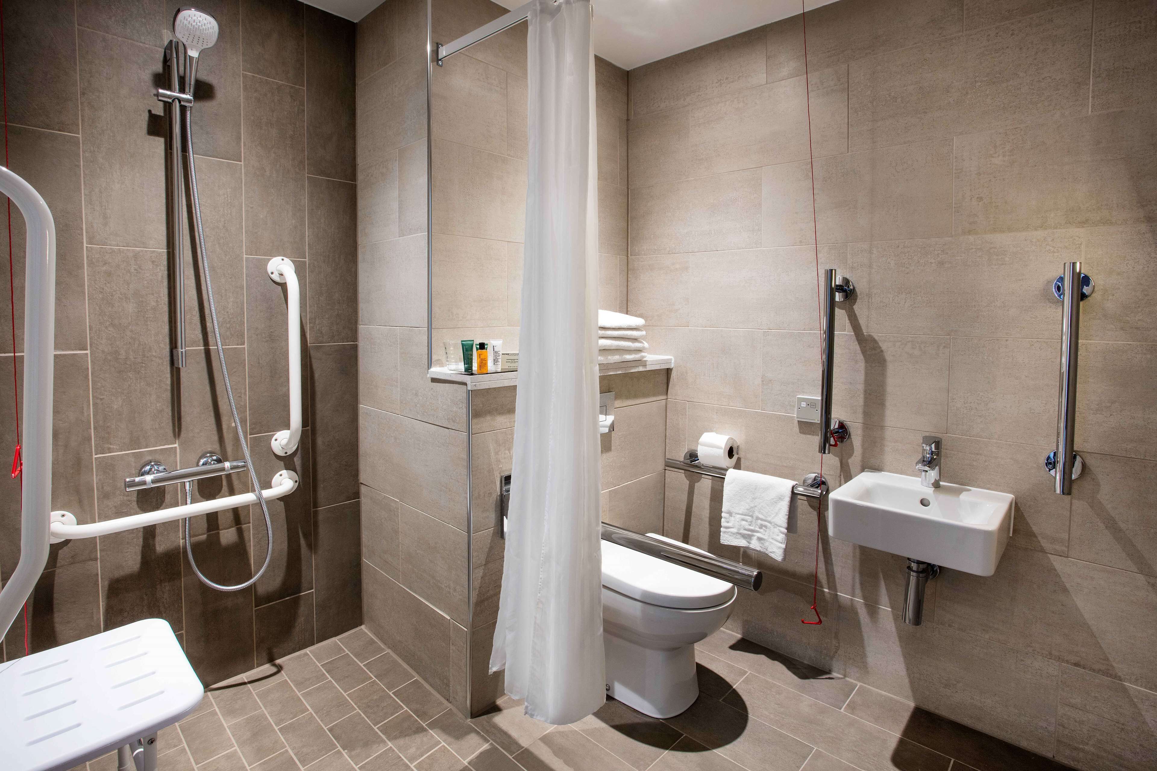 shower, eco-friendly toiletries, hair dryer, towels