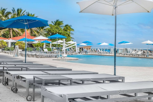 Outdoor pool, pool umbrellas, sun loungers