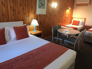 Family Room, Multiple Beds, Non Smoking | Laptop workspace, iron/ironing board, free WiFi, bed sheets