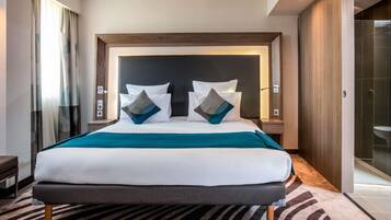 Suite, 1 King Bed with Sofa bed | Minibar, in-room safe, desk, blackout curtains