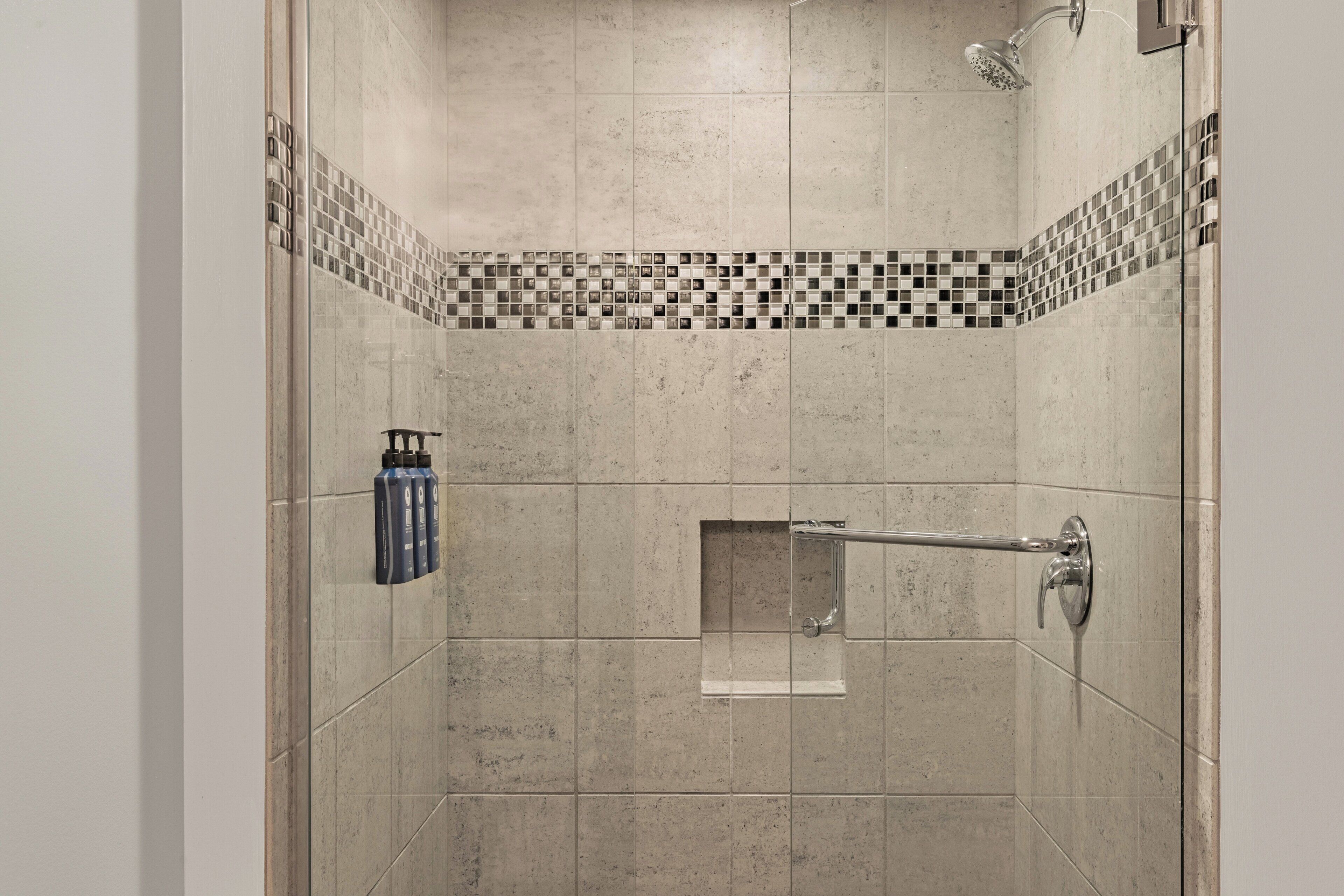 shower, free toiletries, hair dryer, towels