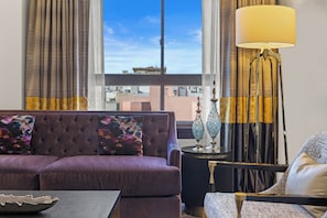 Standard Room, 2 Bedrooms | Living area | Flat-screen TV, DVD player