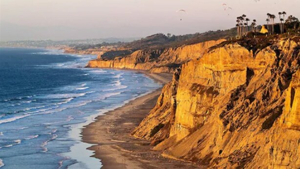 A coastal cliff with a beach and ocean. - Inn By The Sea La Jolla (La Jolla)