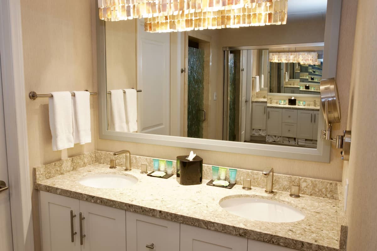 sand dollar suite | bathroom | designer toiletries, hair dryer, towels, soap