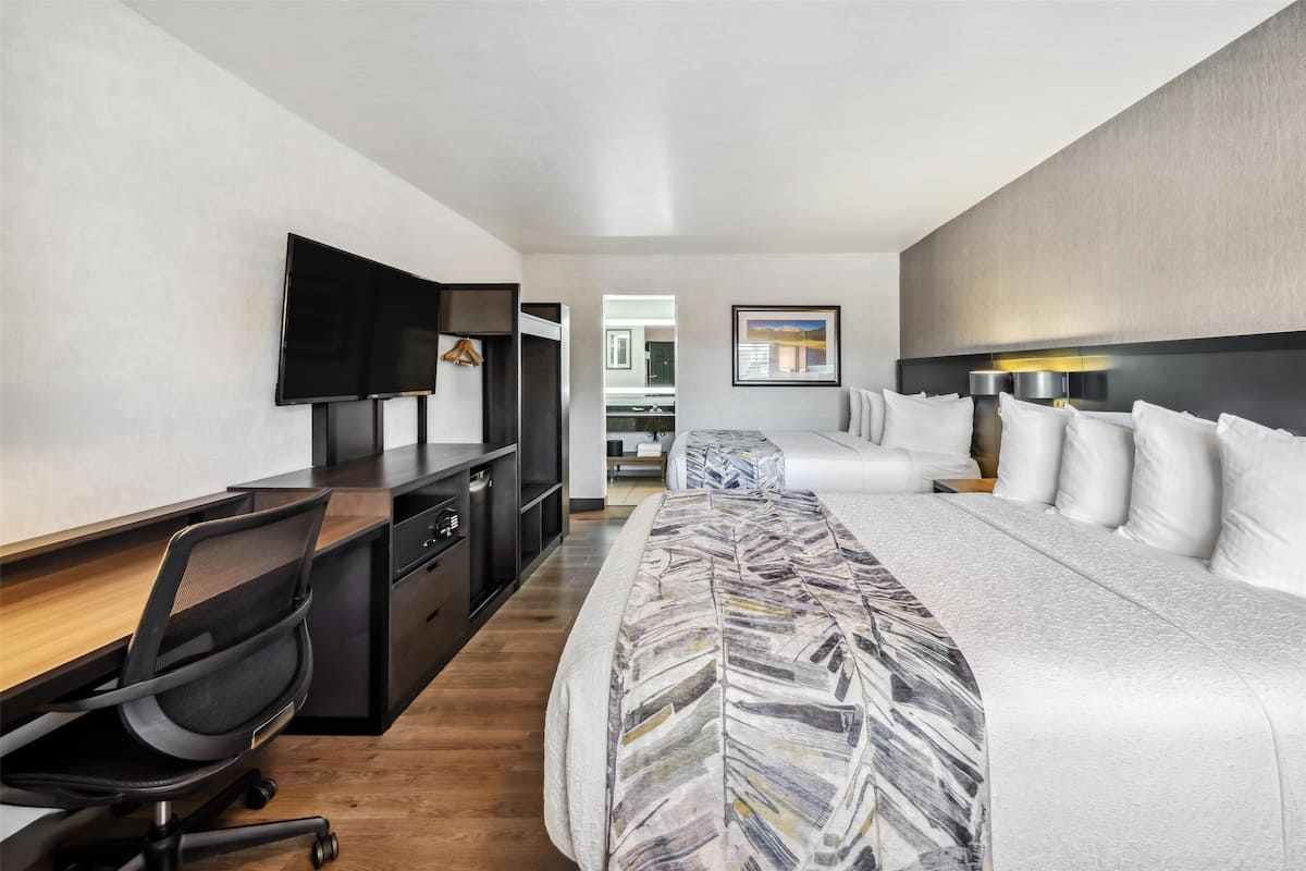 Premium bedding, pillowtop beds, desk, laptop workspace