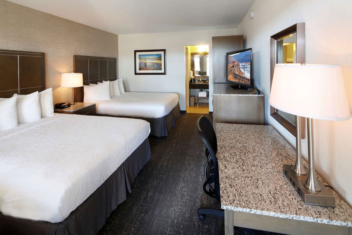 Premium bedding, pillowtop beds, desk, laptop workspace