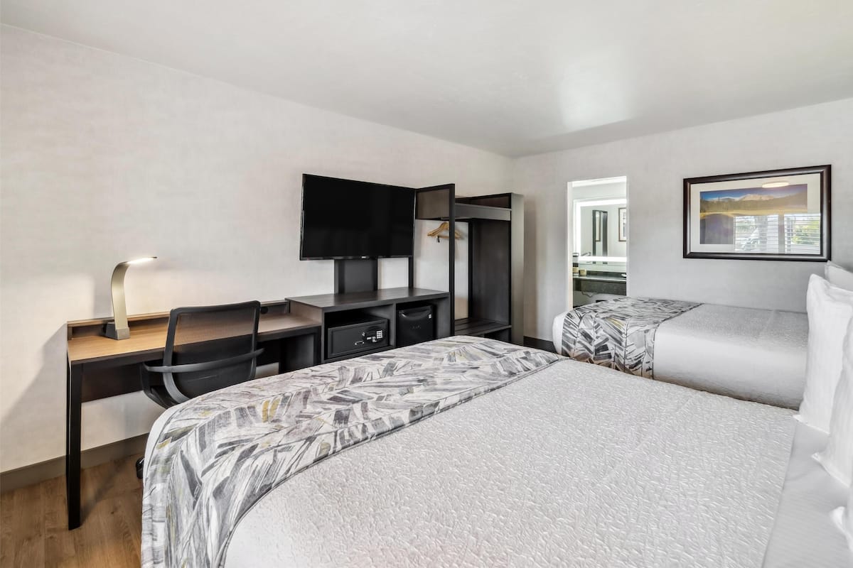 Premium bedding, pillowtop beds, desk, laptop workspace