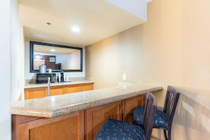 Suite, 1 Bedroom | Private kitchen | Fridge, microwave, coffee/tea maker