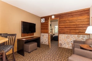 Suite, 1 Bedroom | Living area | 32-inch TV with satellite channels