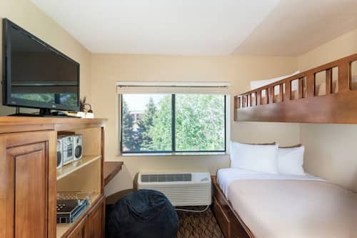 2 Bedroom Family Suite, 1 King and 1 Bunk (Twin over Double) | In-room safe, desk, laptop workspace, iron/ironing board