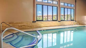 Indoor pool, open 8:00 AM to 11 PM, pool loungers