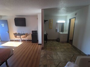 Desk, blackout curtains, iron/ironing board, bed sheets