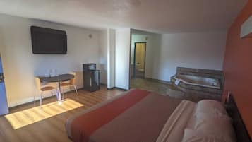 Desk, blackout curtains, iron/ironing board, bed sheets