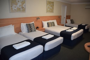 Standard Room, Multiple Beds, Non Smoking | Blackout curtains, soundproofing, iron/ironing board, free WiFi