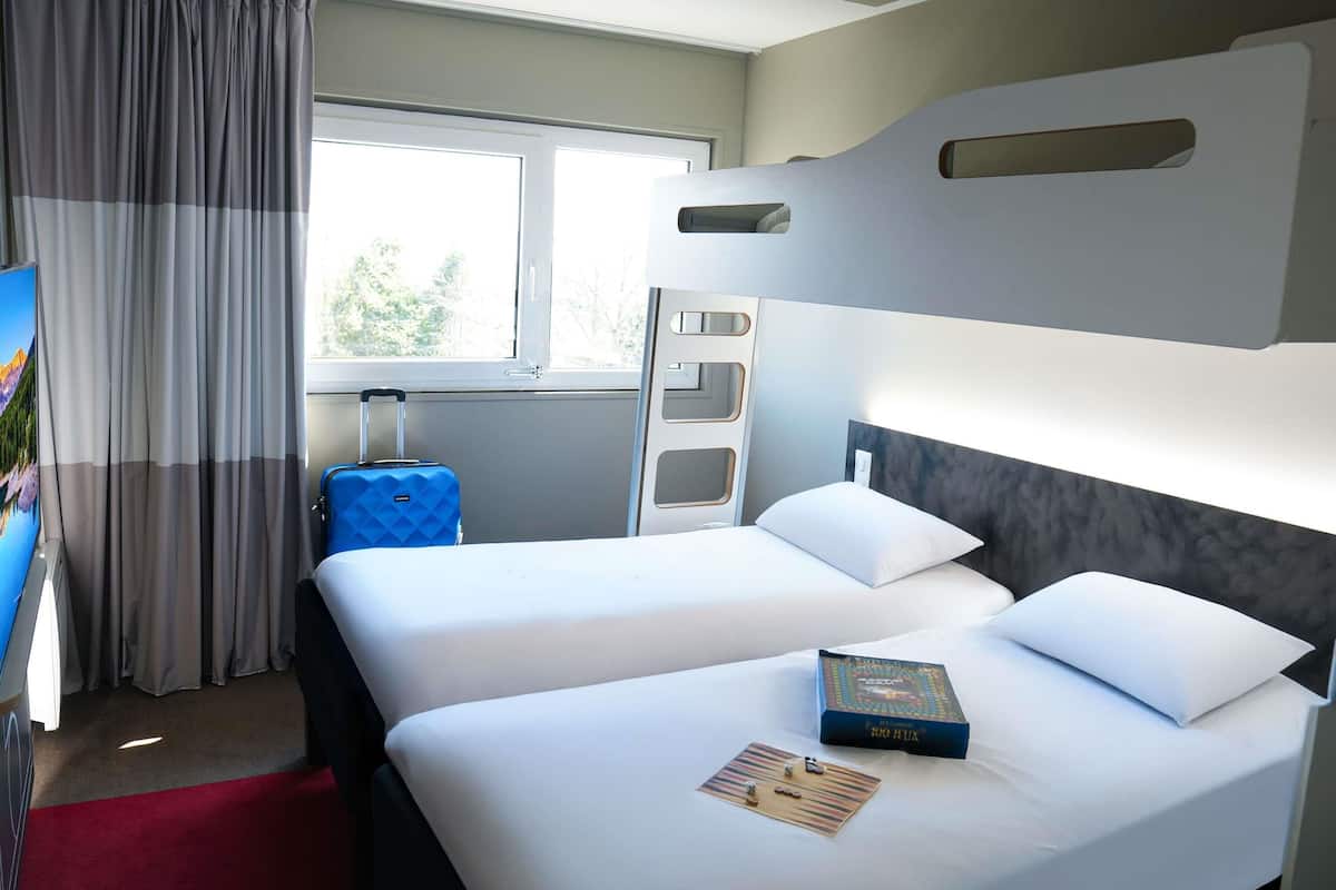 premium bedding, desk, laptop workspace, blackout curtains