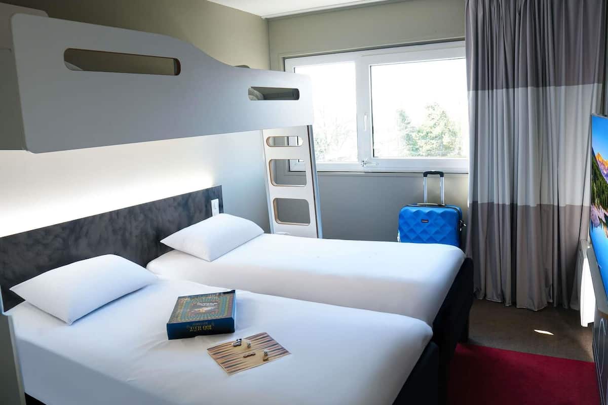 Family Suite, Multiple Beds | Premium bedding, desk, laptop workspace, blackout drapes