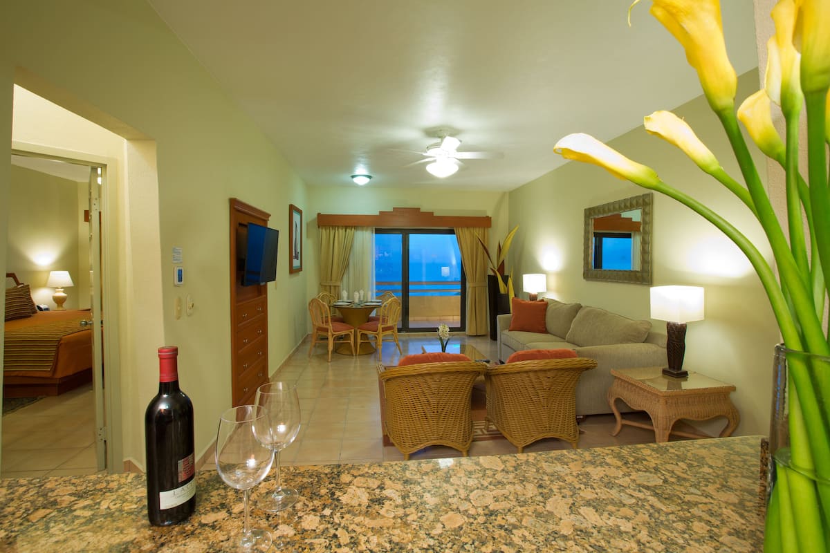 Superior Suite, 2 Bedrooms | Living area | 32-inch LCD TV with digital channels, TV