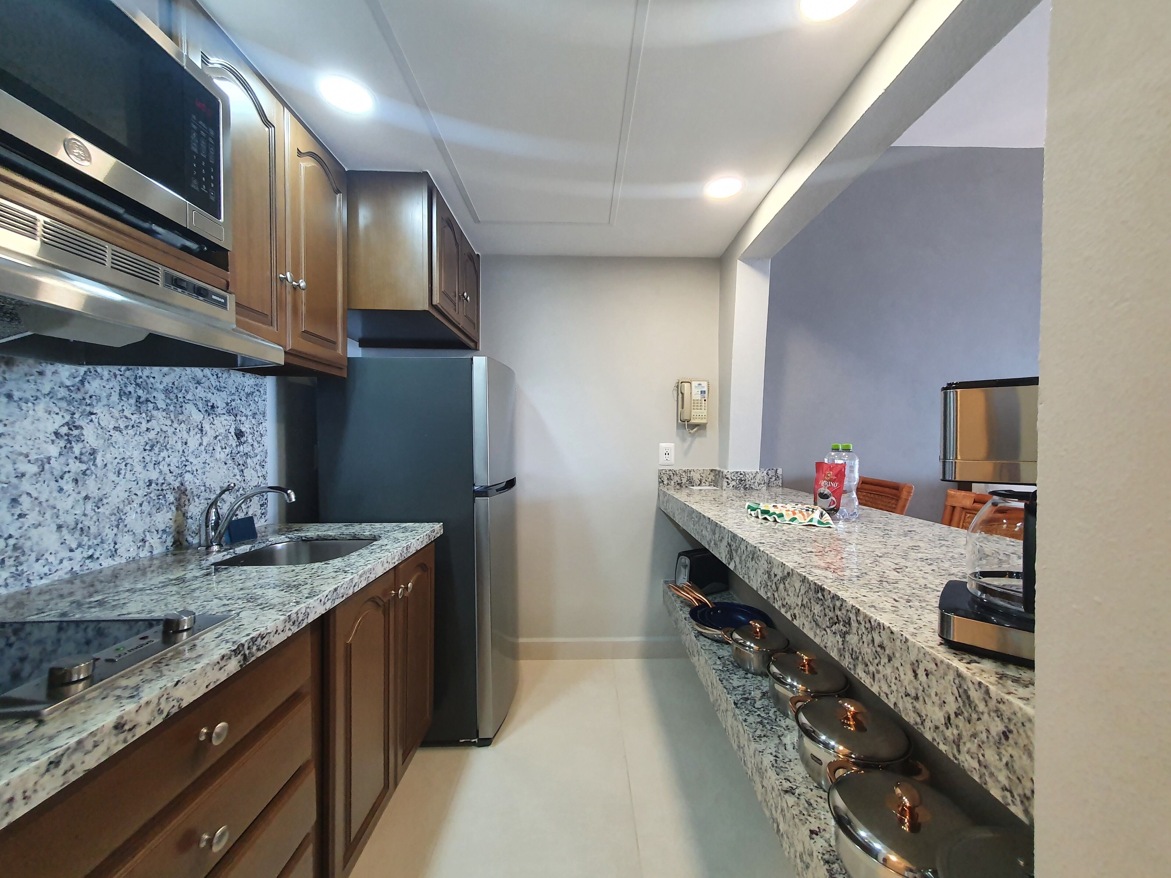 superior studio suite | private kitchenette | fridge, microwave, coffee/tea maker, cookware/dishes/utensils