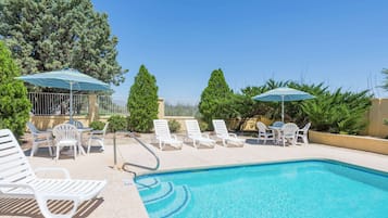 Outdoor pool, sun loungers