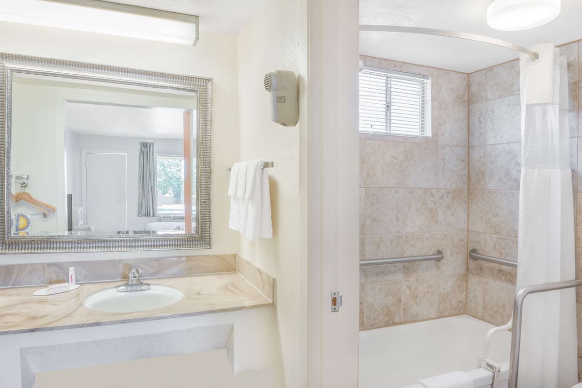 eco-friendly toiletries, hair dryer, towels