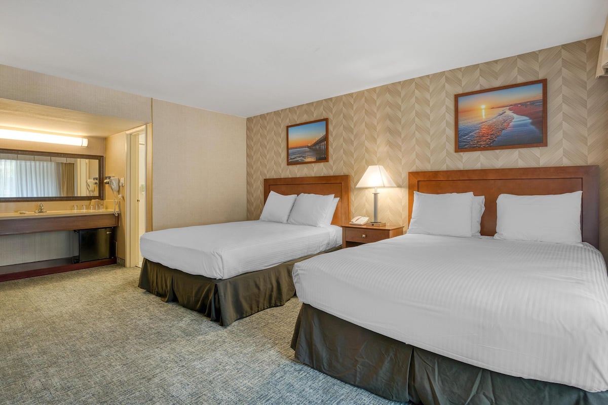 Standard Room, 2 Queen Beds, Non Smoking | In-room safe, desk, blackout drapes, iron/ironing board