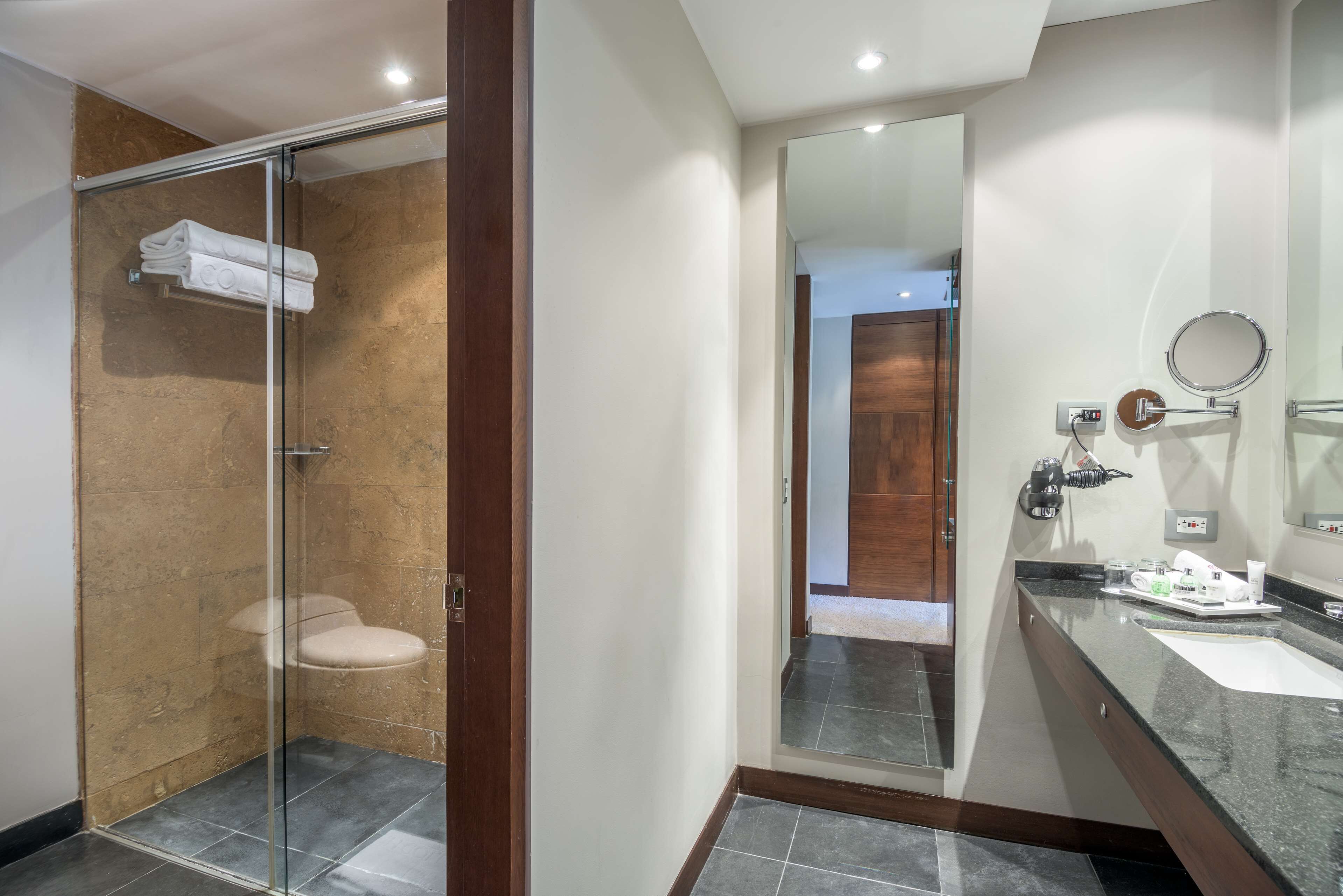 eco-friendly toiletries, hair dryer, bathrobes, towels