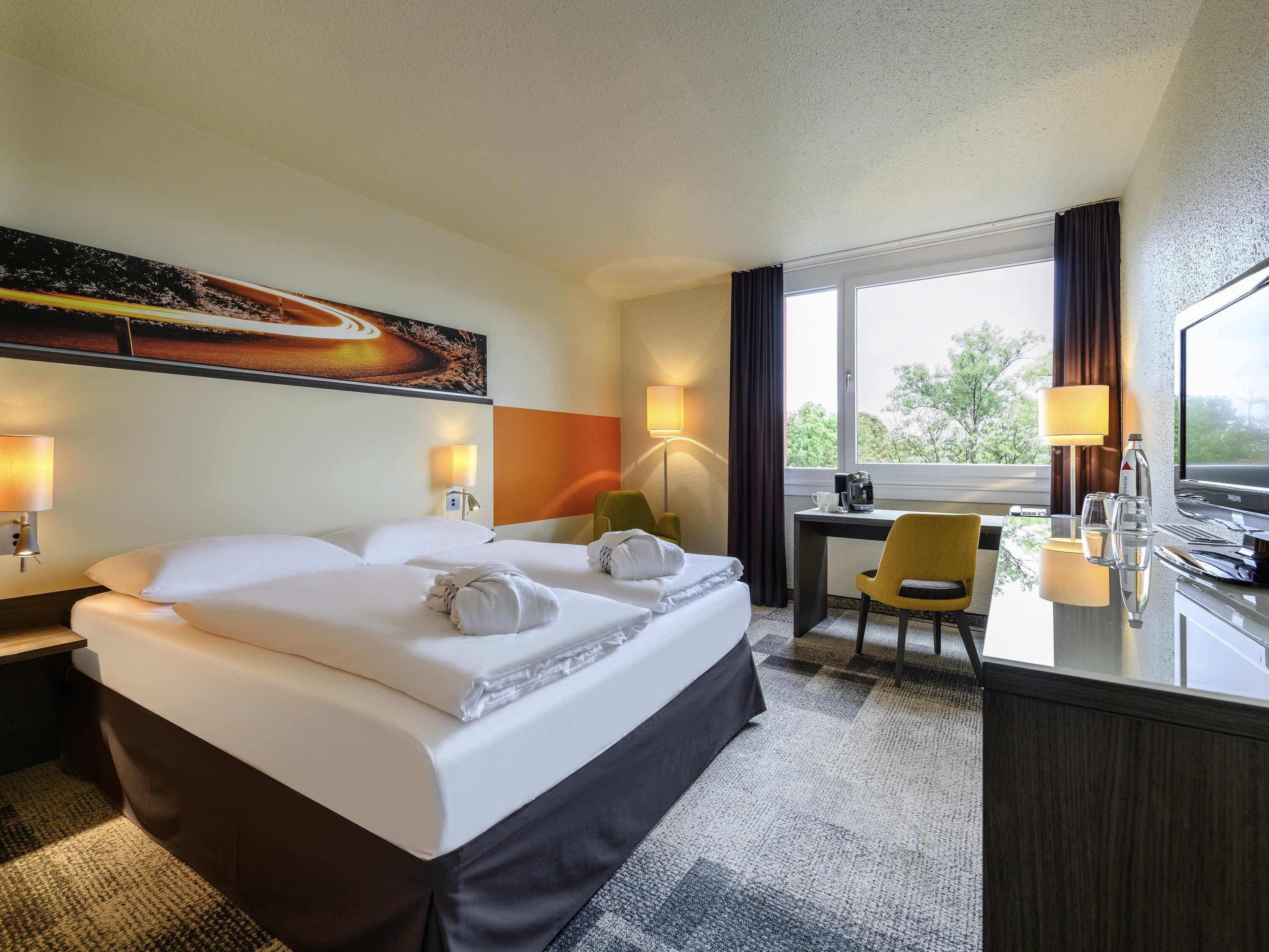 Premium bedding, down comforters, in-room safe, desk