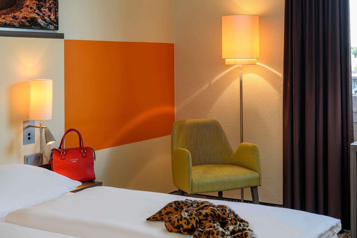 Premium bedding, down duvets, in-room safe, desk