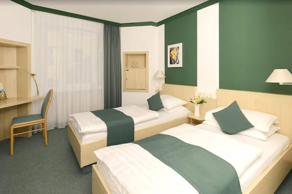 standard double or twin room | 1 bedroom, down duvets, desk, blackout curtains