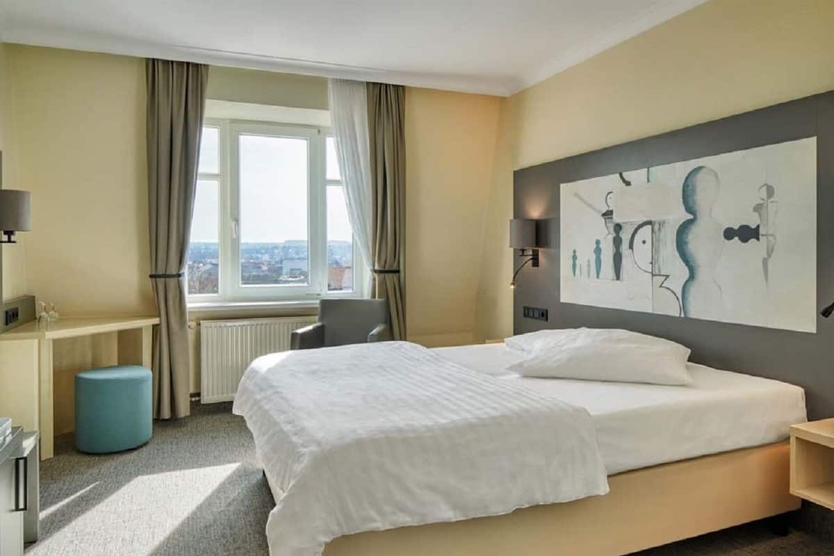 comfort double room | 1 bedroom, down duvets, desk, blackout curtains