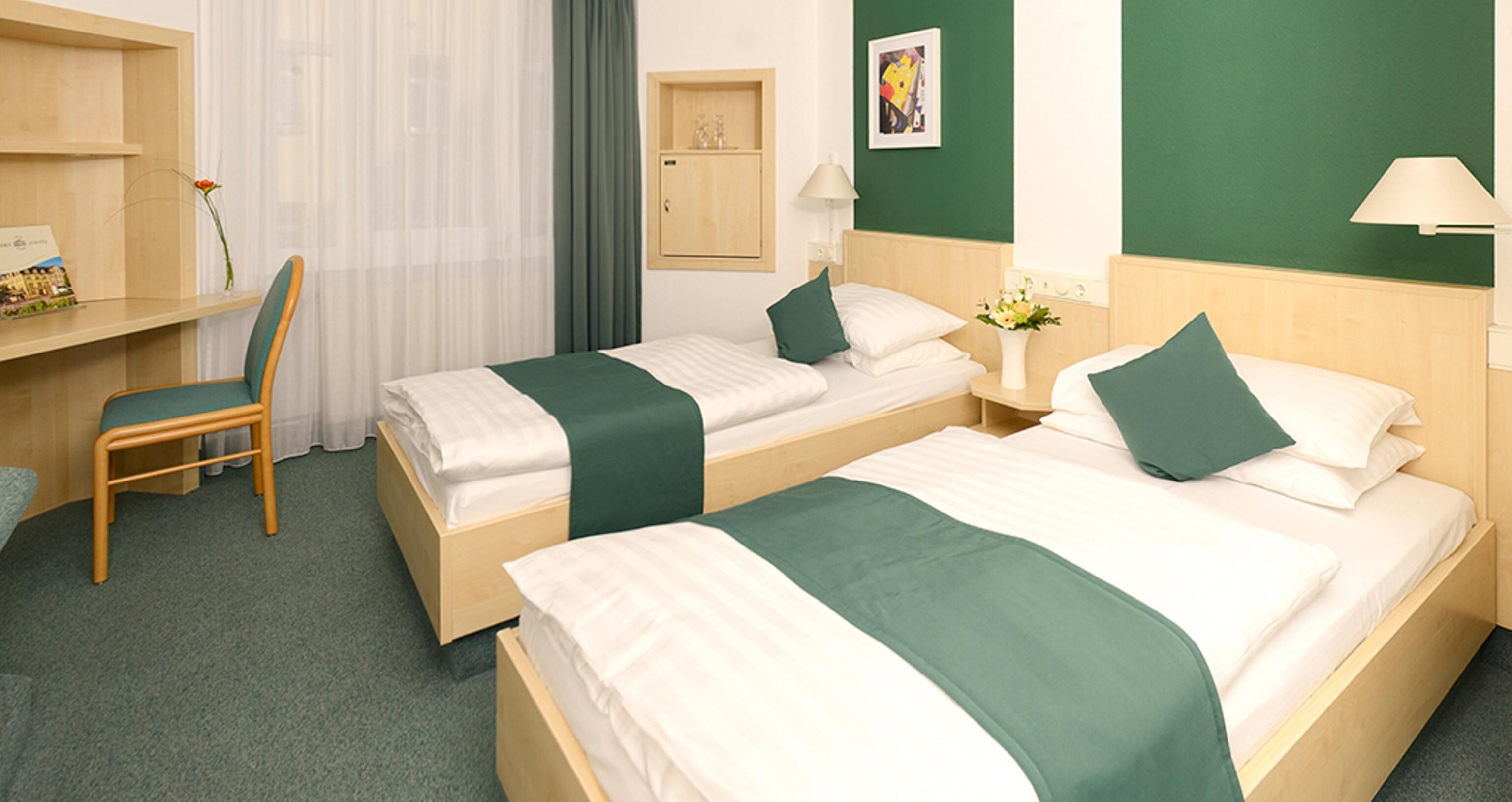 Down comforters, desk, blackout drapes, soundproofing