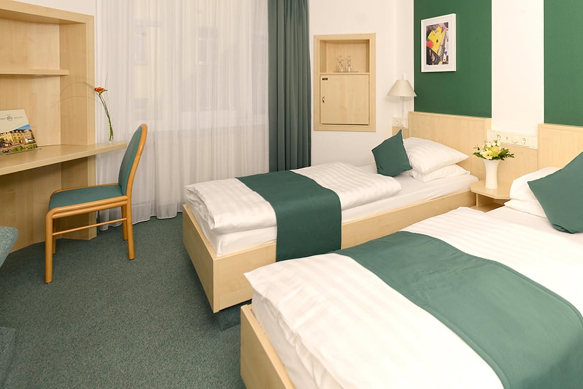 Down comforters, desk, blackout drapes, soundproofing