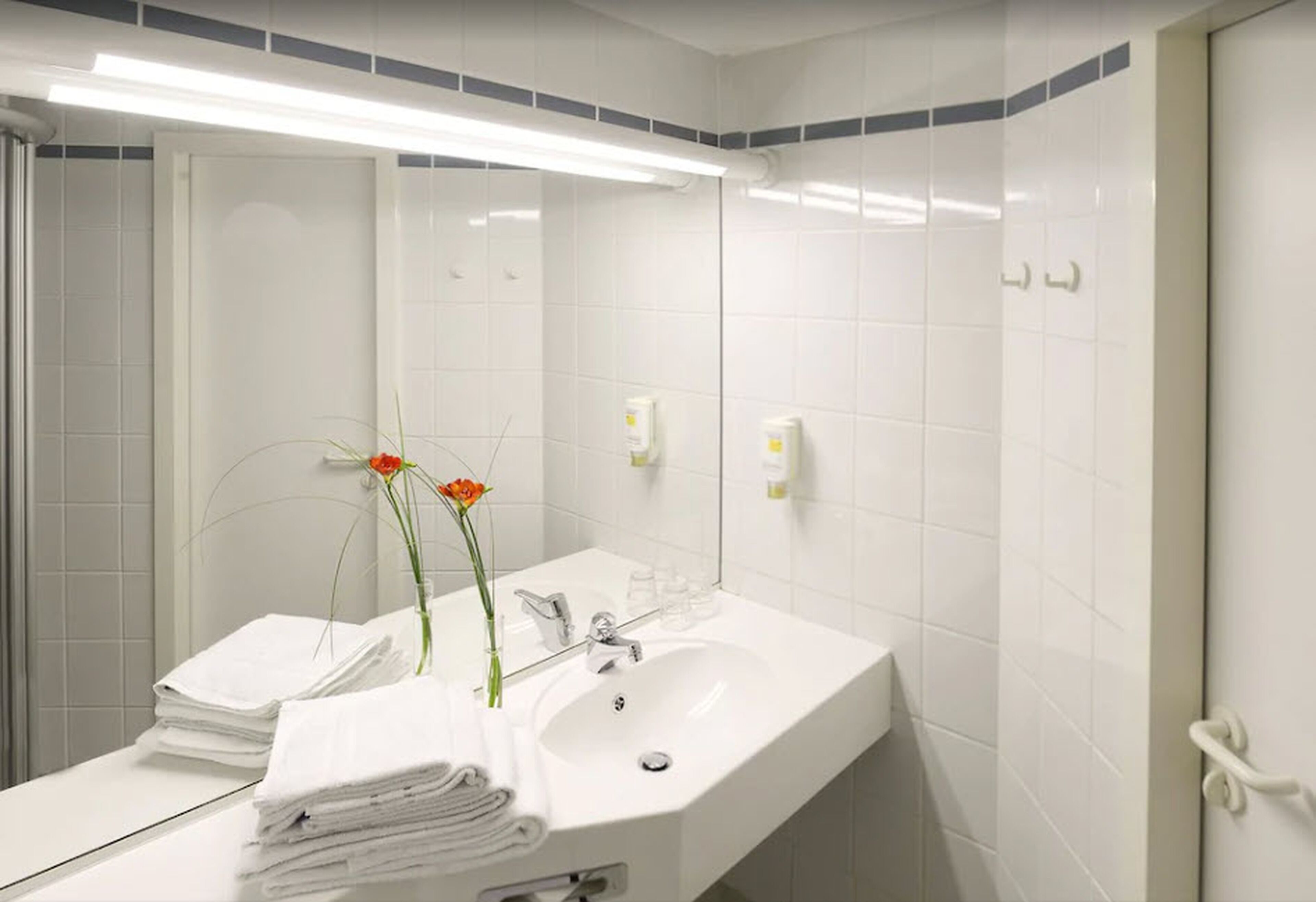 shower, eco-friendly toiletries, hair dryer, towels