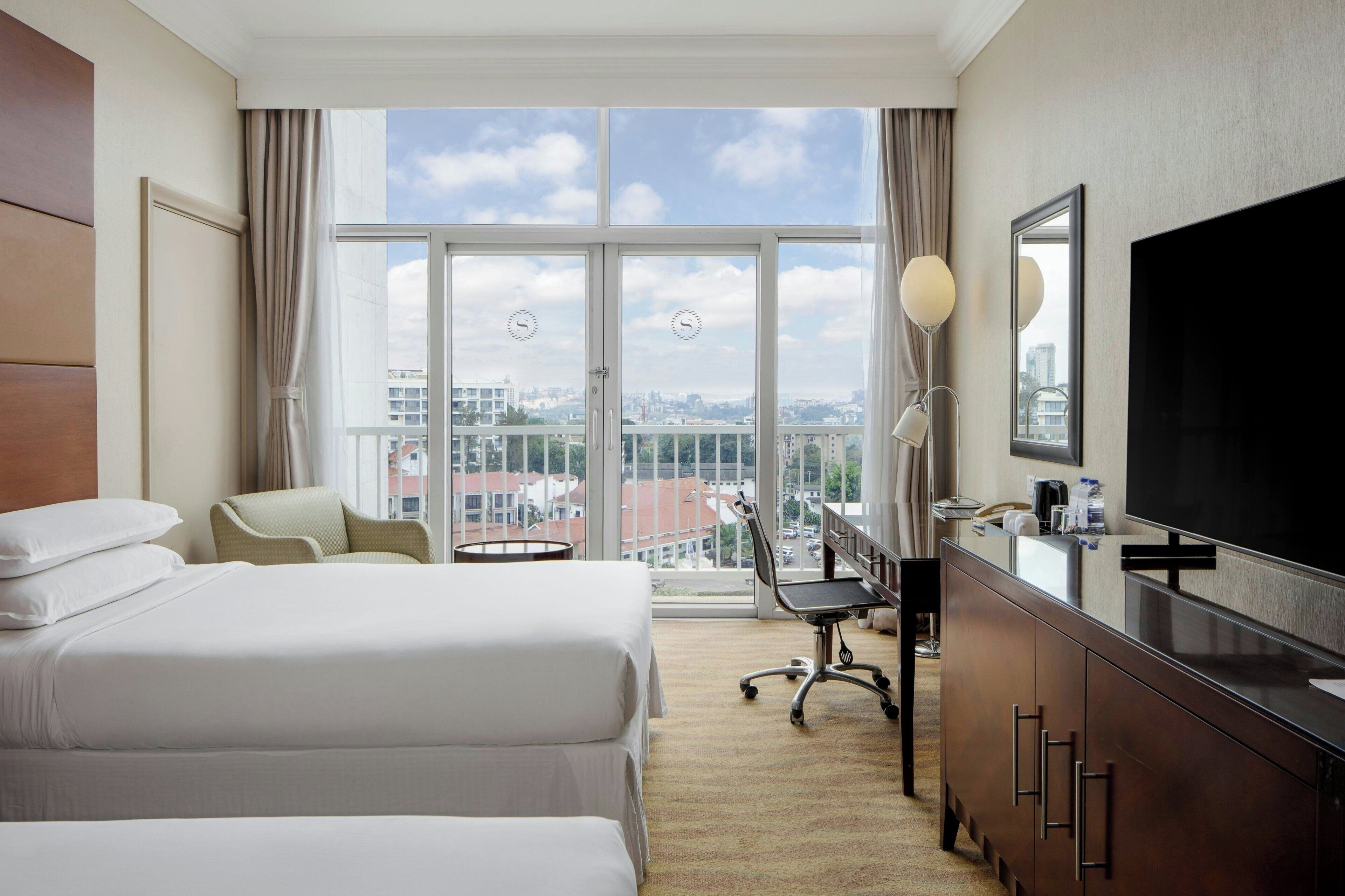 Deluxe Room, 2 Twin Beds (Balcony) | Minibar, in-room safe, desk, blackout drapes