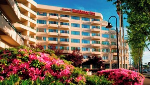 A multi-story hotel with a prominent sign reading "Marriott Residence Inn."