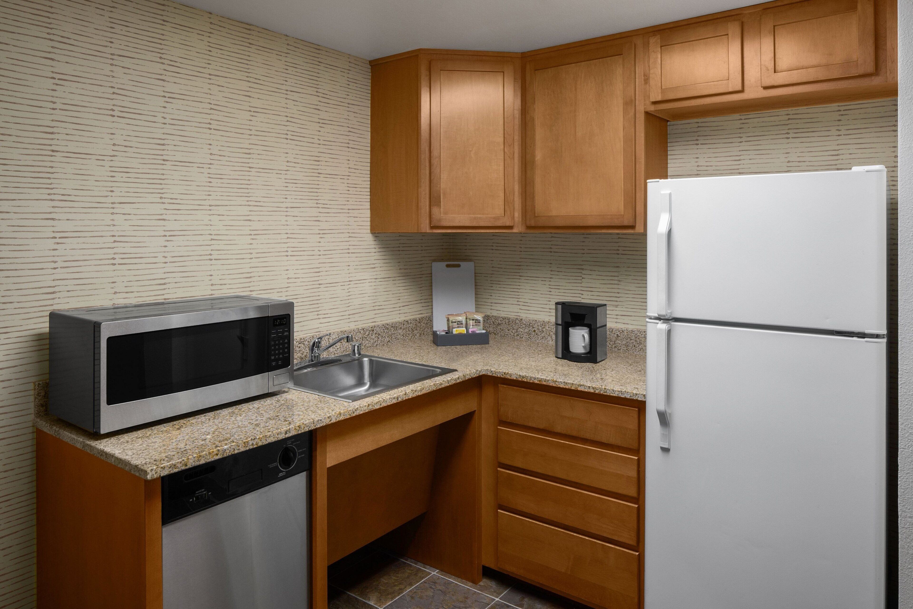 suite, 1 bedroom, balcony (mobility accessible, roll-in shower) | private kitchen | full-sized fridge, microwave, stovetop, dishwasher