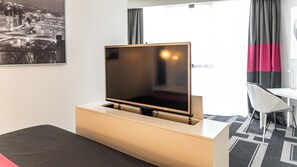 Suite, 1 King Bed with Sofa bed | Minibar, in-room safe, individually furnished, desk