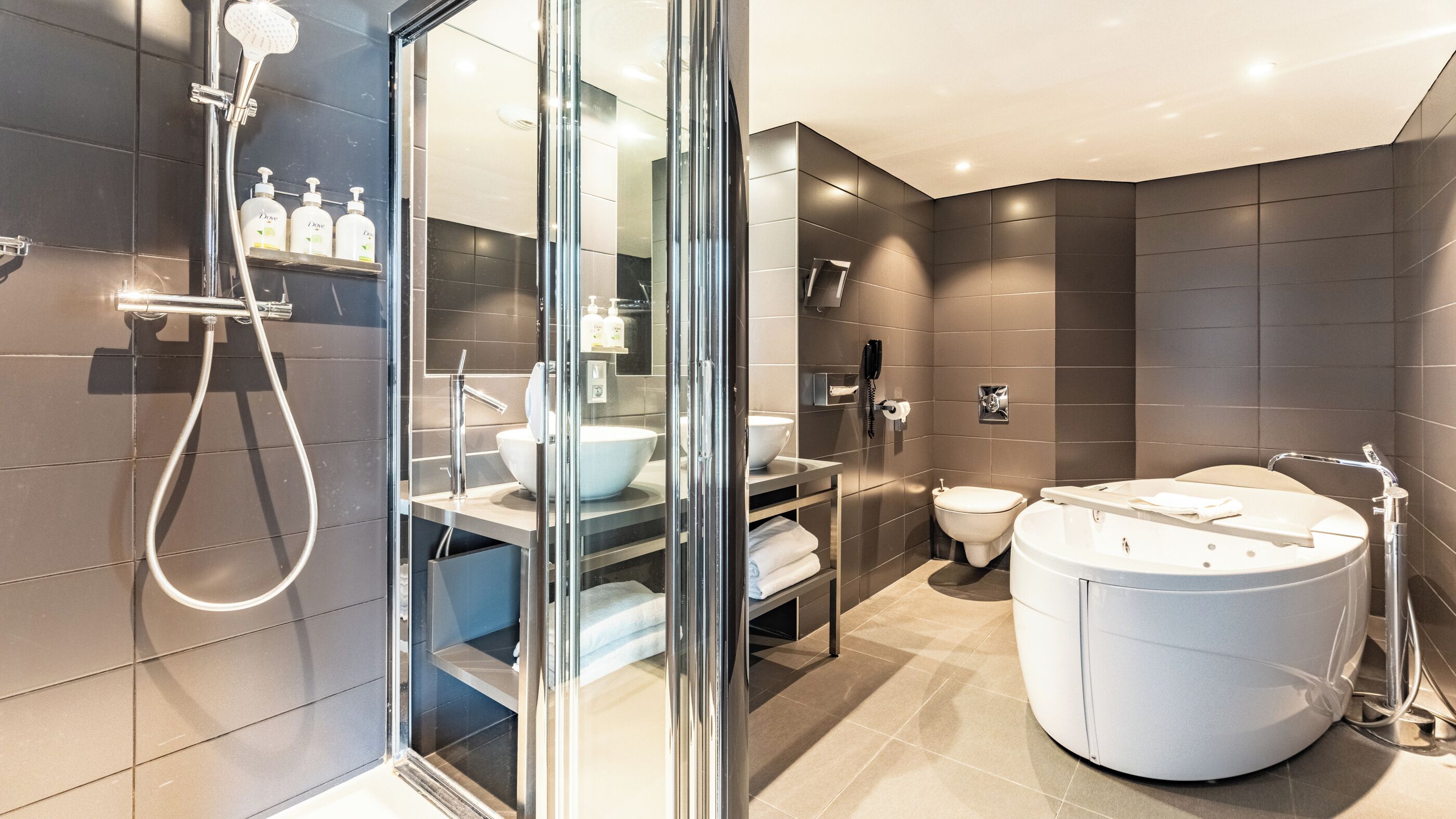 suite, 1 king bed with sofa bed | bathroom | free toiletries, hair dryer, towels, soap