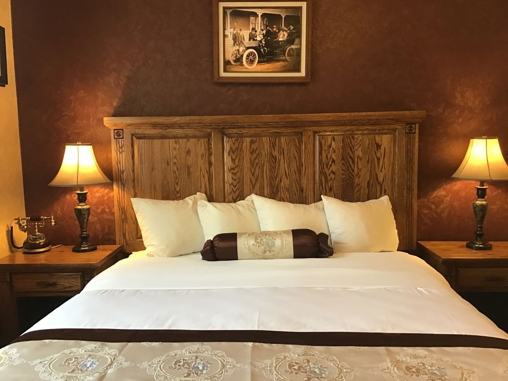 Desk, iron/ironing board, bed sheets