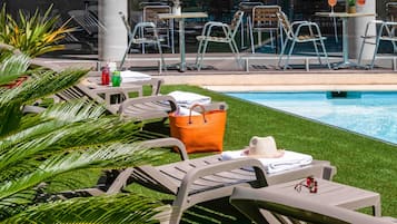 Seasonal outdoor pool, open 10:00 AM to 8:00 PM, sun loungers