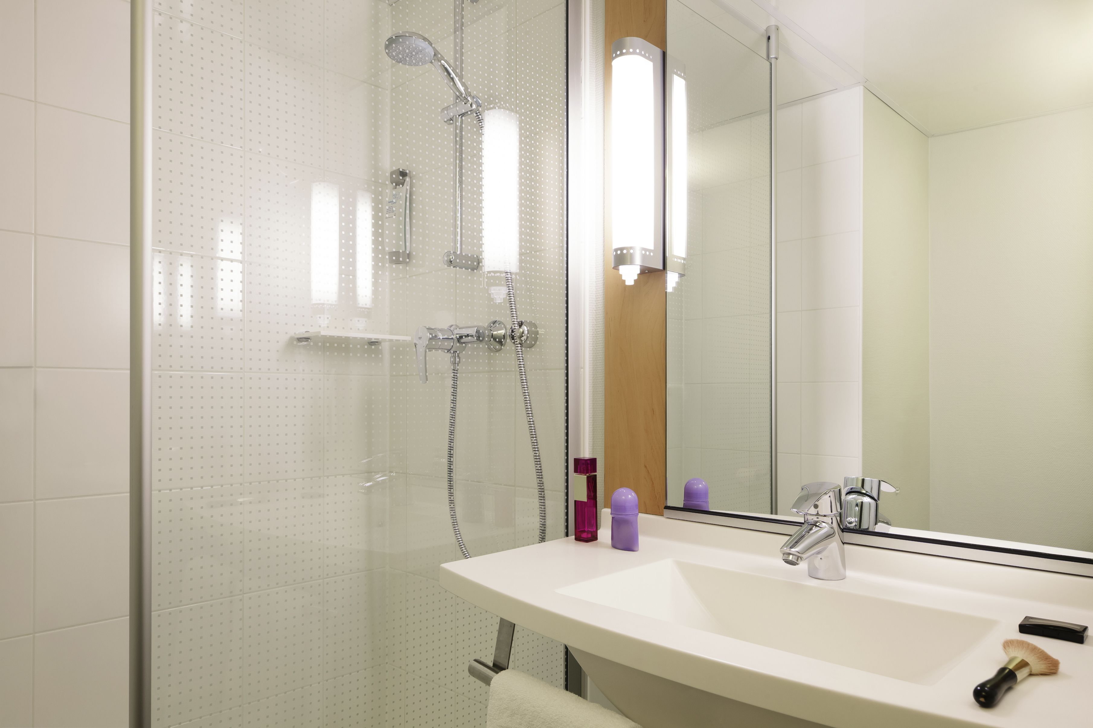 shower, eco-friendly toiletries, hair dryer, towels