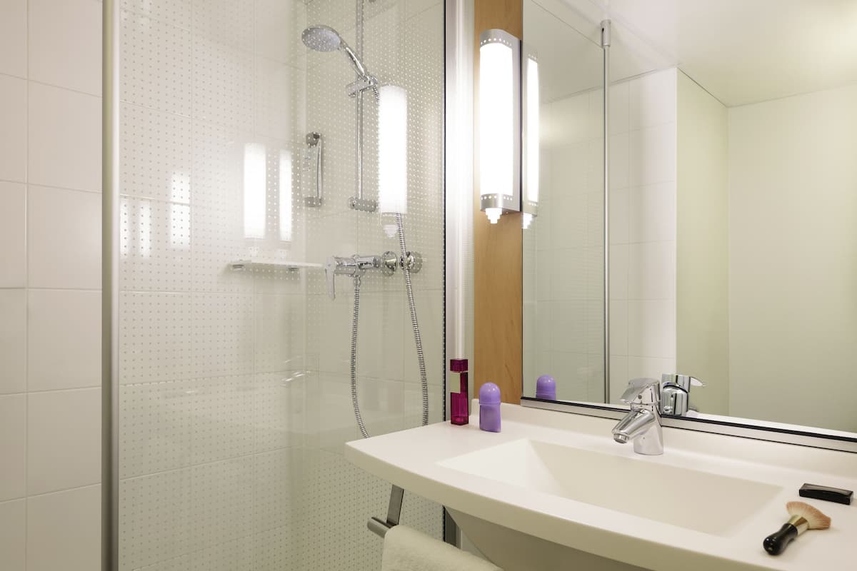 shower, eco-friendly toiletries, hair dryer, towels