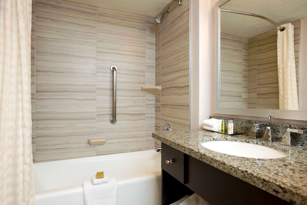 shower, eco-friendly toiletries, hair dryer, towels