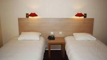 Desk, blackout drapes, free cribs/infant beds, rollaway beds