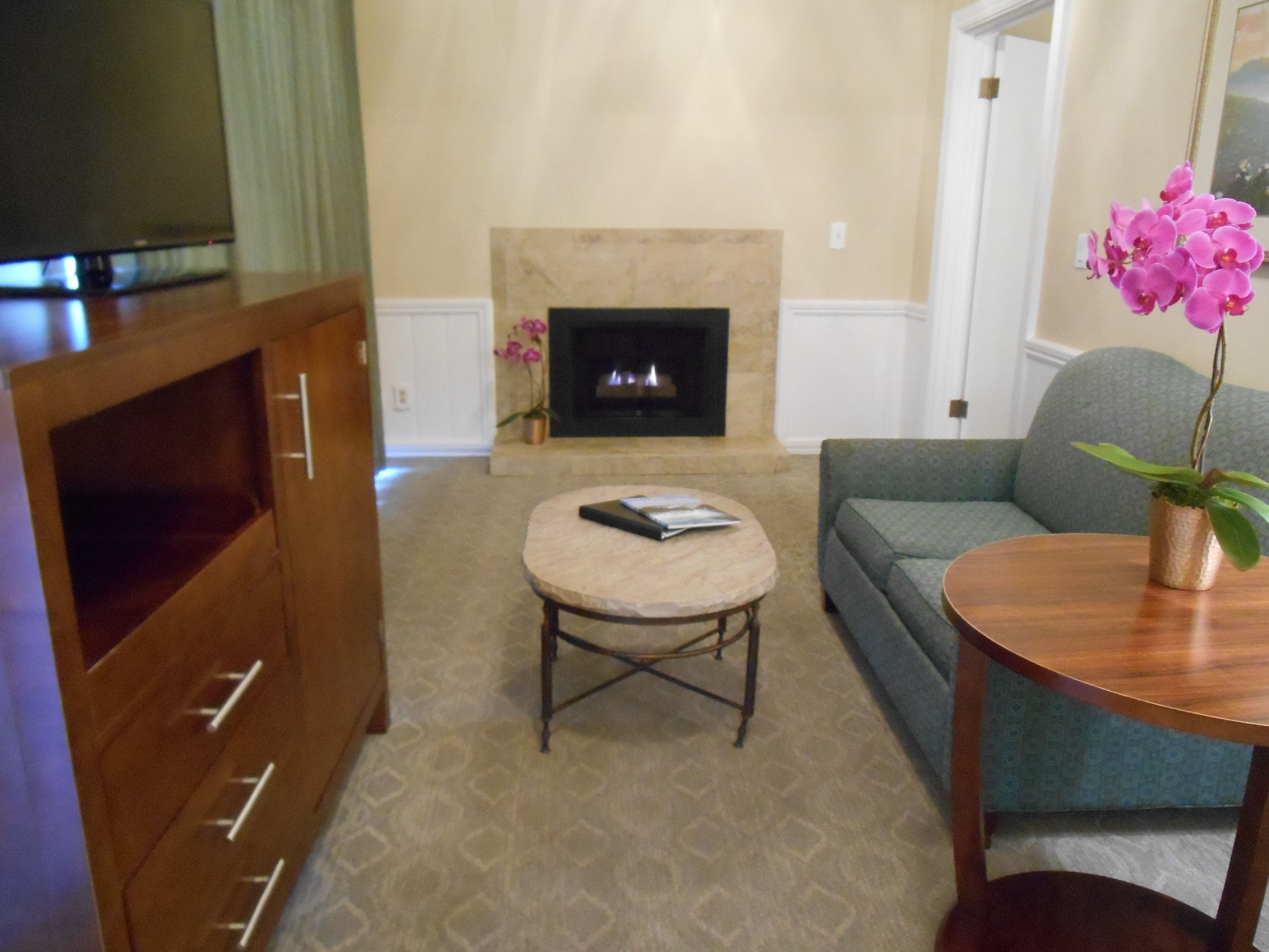 suite, multiple beds | living room | tv