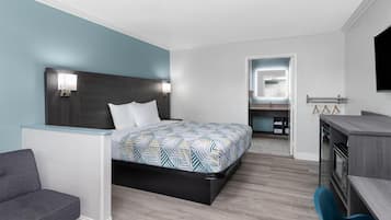 Kamer, 1 kingsize bed | Een kluis op de kamer, een bureau, verduisterende gordijnen