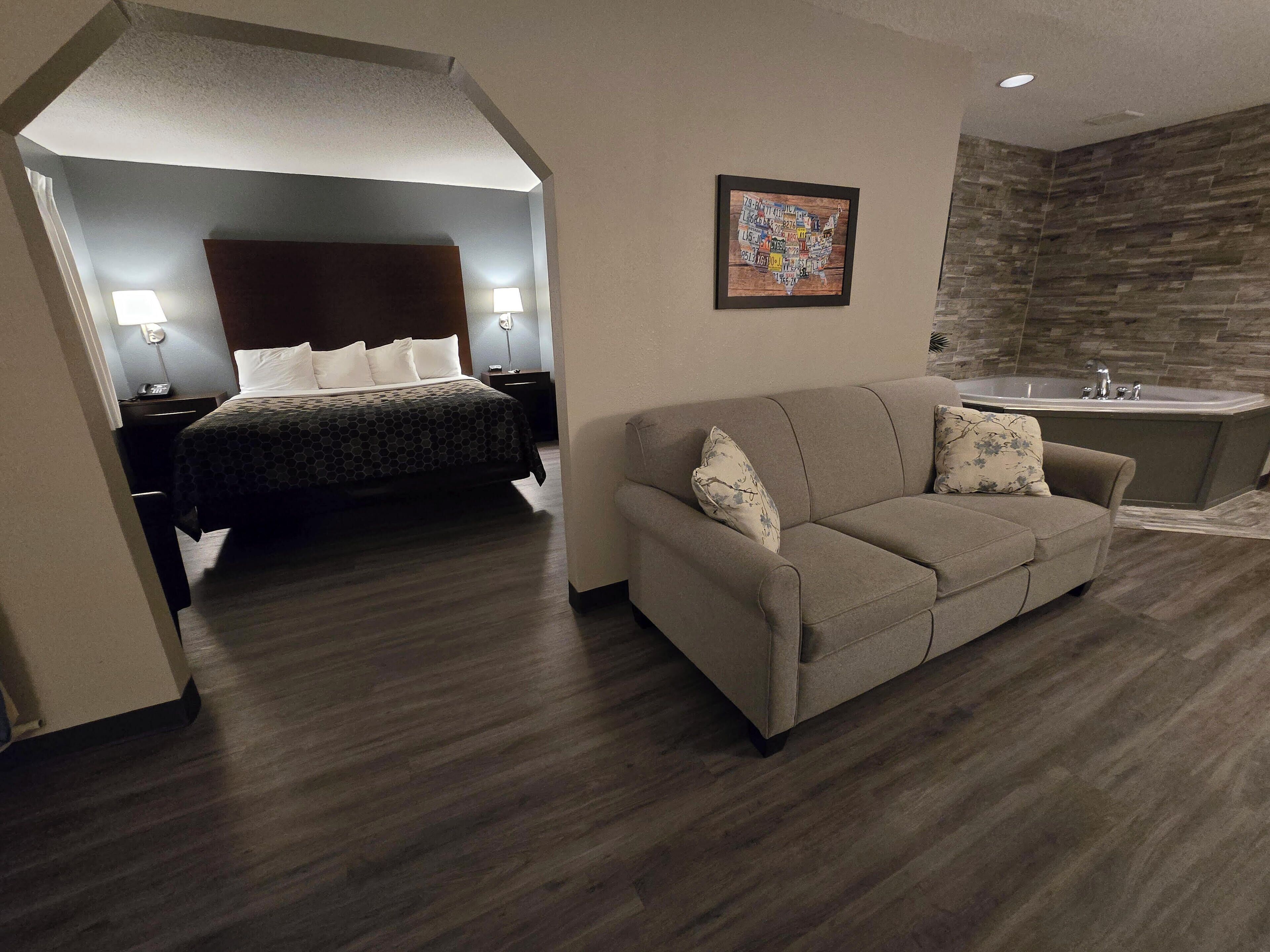 Honeymoon Suite, 1 King Bed with Sofa bed, Non Smoking | Laptop workspace, iron/ironing board, travel crib, free WiFi