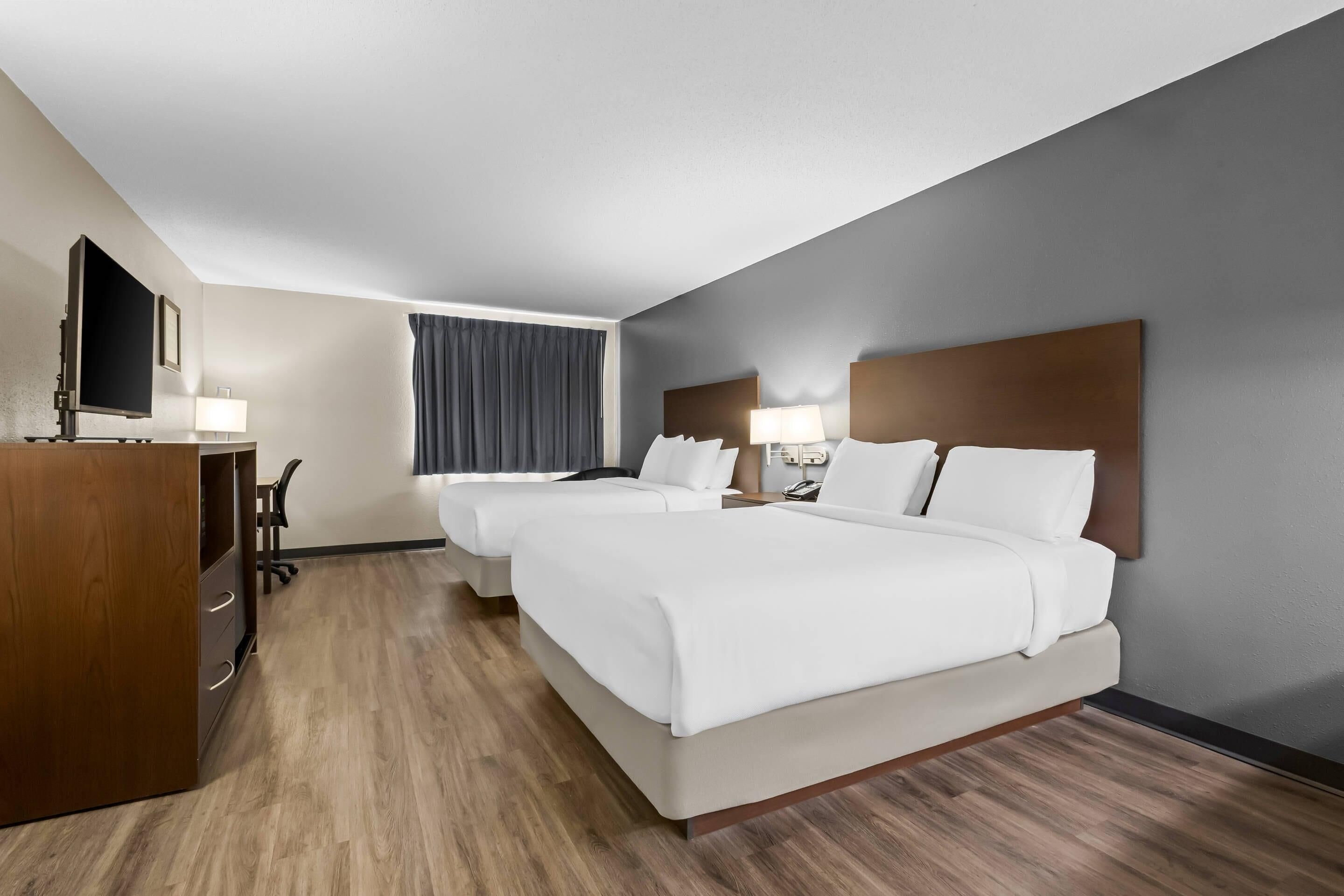 Room, 2 Queen Beds, Non Smoking | Laptop workspace, iron/ironing board, free WiFi, bed sheets